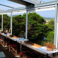 Bâche pour fermer une pergola du restaurant le welcome café